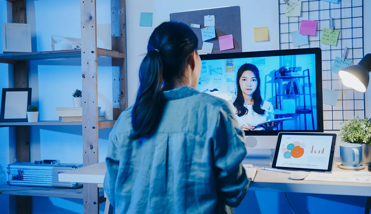 Woman In Front Of Computer Video Call